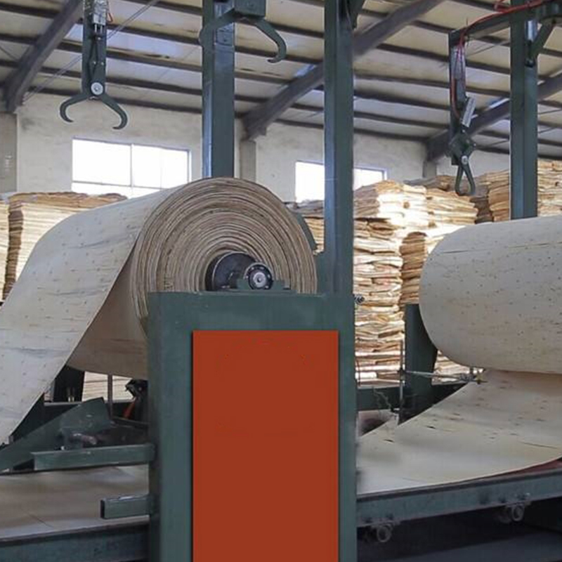 Automatic core veneer composer veneer reeling system